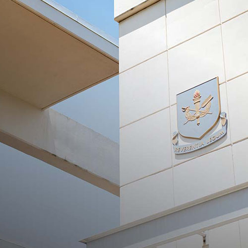 JAG crest on side of building